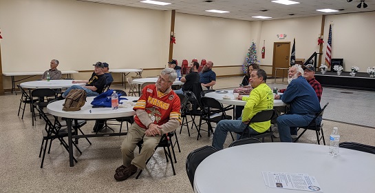 Post members watching the Army-Navy Game